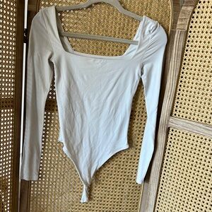 Aritzia White Long Sleeve Bodysuit